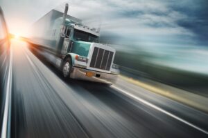 baltimore freightliner truck driving in windy conditions